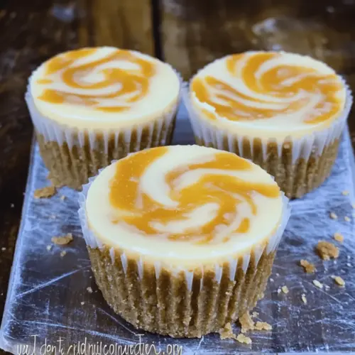 Mini Pumpkin Swirled Cheesecakes